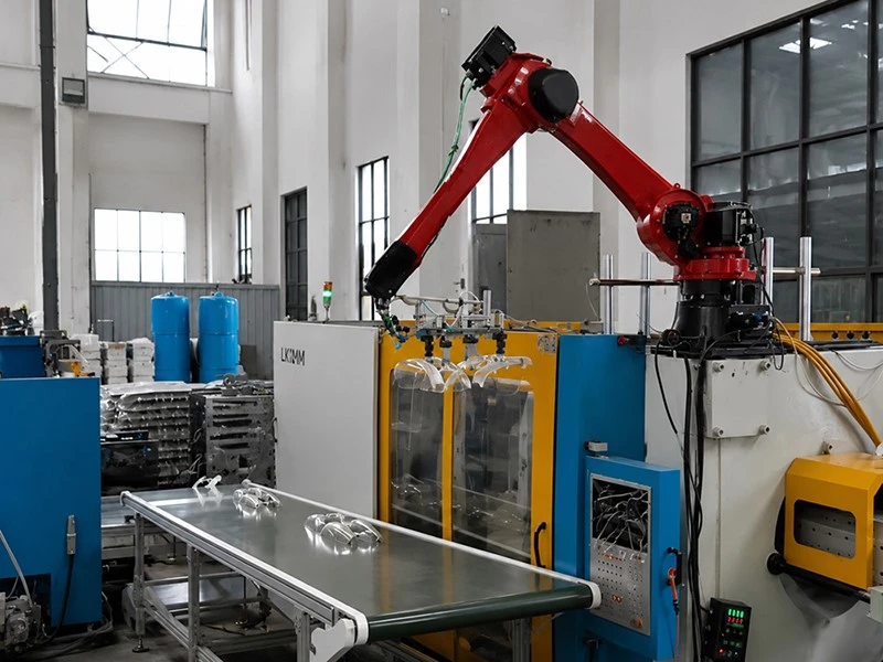 Top-Mounted IMM Robot for Automotive Interior Part Removal Top-Mounted IMM Robot for Automotive Interior Part Removal